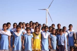 Carbon offset project: Rajasthan Wind Power - wind turbine and school students